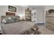 Comfortable bedroom featuring a large bed and stylish decor throughout at 241 Riverside Dr # 201, Daytona Beach, FL 32117