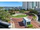 Welcoming entrance with lush landscaping, water features, and a gated entry at 241 Riverside Dr # 201, Daytona Beach, FL 32117