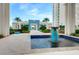 Beautifully landscaped entrance with a fountain and elegant walkway at 241 Riverside Dr # 201, Daytona Beach, FL 32117