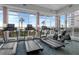 Well-equipped gym with treadmills, stationary bikes, and panoramic water views at 241 Riverside Dr # 201, Daytona Beach, FL 32117