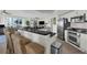 Modern kitchen with stainless steel appliances, breakfast bar, and barstool seating at 241 Riverside Dr # 201, Daytona Beach, FL 32117