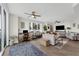 Open concept living room with view, desk, couches, and modern decor at 241 Riverside Dr # 201, Daytona Beach, FL 32117