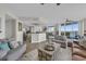 Spacious living room and kitchen combo with wood floors and water view at 241 Riverside Dr # 201, Daytona Beach, FL 32117