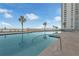 Resort style pool with views of the city skyline and waterfront at 241 Riverside Dr # 201, Daytona Beach, FL 32117