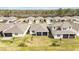 Aerial view of the neighborhood, with a number of single Gathering homes on large lots at 2496 Pine Preserve Ct, St Cloud, FL 34771