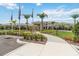 Attractive building and manicured landscaping creating a welcoming and elegant atmosphere at 2496 Pine Preserve Ct, St Cloud, FL 34771
