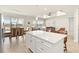 Open concept living and dining area with lots of light and views of the pond at 2496 Pine Preserve Ct, St Cloud, FL 34771