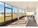Screened patio has brick flooring with peaceful views of the lake and backyard at 2496 Pine Preserve Ct, St Cloud, FL 34771