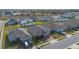 Neighborhood aerial view featuring well-maintained lawns, sidewalks, and neatly arranged single-Gathering homes at 253 Golden Sands Cir, Davenport, FL 33837