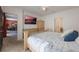 Spacious bedroom featuring a large TV and views into the dining room at 253 Golden Sands Cir, Davenport, FL 33837