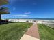 Private walkway to beach with lush landscaping at 3501 S Atlantic Ave # 6060, New Smyrna Beach, FL 32169