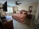 King-size bed, nightstands and TV at 3501 S Atlantic Ave # 6060, New Smyrna Beach, FL 32169