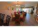 Dining room with partial living room view at 3501 S Atlantic Ave # 6060, New Smyrna Beach, FL 32169