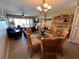 Open concept dining area with view into living room at 3501 S Atlantic Ave # 6060, New Smyrna Beach, FL 32169