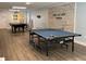 Community game room with pool table and ping pong at 3501 S Atlantic Ave # 6060, New Smyrna Beach, FL 32169