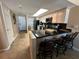 Modern kitchen with breakfast bar and stainless steel appliances at 3501 S Atlantic Ave # 6060, New Smyrna Beach, FL 32169