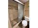Walk-in shower with tiled walls and glass door at 3501 S Atlantic Ave # 6060, New Smyrna Beach, FL 32169