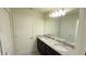 Bathroom with granite countertop and double sinks at 4114 Lana Ave, Davenport, FL 33897