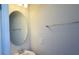 Simple half-bathroom with vanity and oval mirror at 4114 Lana Ave, Davenport, FL 33897