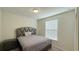 Spacious bedroom with neutral decor and window blinds at 4114 Lana Ave, Davenport, FL 33897