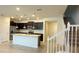 Modern kitchen with granite island and stainless steel appliances at 4114 Lana Ave, Davenport, FL 33897
