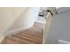 Carpeted stairs leading to the upper level at 4114 Lana Ave, Davenport, FL 33897