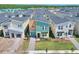 Aerial view of new construction homes with modern designs and landscaping at 4285 Prologue Way, Kissimmee, FL 34746