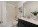 Clean bathroom with bathtub, shower, and modern vanity at 4285 Prologue Way, Kissimmee, FL 34746