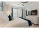 Bright bedroom with a king-size bed and plenty of natural light at 4285 Prologue Way, Kissimmee, FL 34746