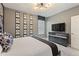 Bedroom with king-size bed, TV, and built-in dresser at 4285 Prologue Way, Kissimmee, FL 34746