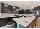 Modern kitchen with dark cabinetry and island at 4285 Prologue Way, Kissimmee, FL 34746