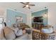 Modern living room features stylish furniture and a large TV at 4285 Prologue Way, Kissimmee, FL 34746
