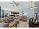 Open living room with large windows and view at 4285 Prologue Way, Kissimmee, FL 34746