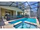 Relaxing pool and spa with covered patio and comfortable seating at 4285 Prologue Way, Kissimmee, FL 34746