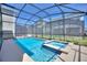 Enclosed pool and spa area with plenty of sunshine at 4285 Prologue Way, Kissimmee, FL 34746