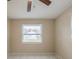Bedroom with tile floor and a window providing natural light at 451 Rogers St, Orlando, FL 32811