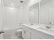 Bright, clean bathroom with double vanity, tiled shower, and modern fixtures at 4543 Sidesaddle Trl, St Cloud, FL 34772
