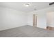 Bedroom featuring neutral carpet and a doorway to a bathroom at 4543 Sidesaddle Trl, St Cloud, FL 34772
