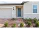 Attractive home exterior with a well-maintained brick walkway leading to the front door at 4543 Sidesaddle Trl, St Cloud, FL 34772