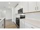 This well-appointed kitchen boasts modern stainless steel appliances and sleek countertops at 4543 Sidesaddle Trl, St Cloud, FL 34772