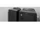 Side by side black washer and dryer set at 4543 Sidesaddle Trl, St Cloud, FL 34772