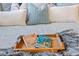 Close up on pillows, books and a faux fur blanket on the bed at 4608 Egg Harbor Dr, Kissimmee, FL 34746