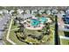 Beautiful community pool surrounded by lush landscaping and well-maintained grounds at 4608 Egg Harbor Dr, Kissimmee, FL 34746