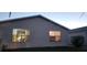 Rear view of house showing windows and yard at 482 Hildalgo Dr, The Villages, FL 32159
