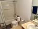 Bathroom featuring a bathtub, a shower, a toilet, and a functional sink at 525 Aster Dr, Davenport, FL 33897