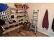 Organized closet with shelving, storage and clothing, offering efficient space utilization at 525 Aster Dr, Davenport, FL 33897