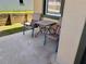 Cozy patio with seating, perfect for relaxing and enjoying the outdoors at 525 Aster Dr, Davenport, FL 33897