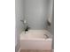 Bathroom with a bathtub and decorative candles at 5610 Forest Ridge Dr, Winter Haven, FL 33881