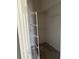 Walk-in closet featuring adjustable metal shelving for efficient storage and organization at 5610 Forest Ridge Dr, Winter Haven, FL 33881