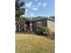 Charming single-story home with a well-maintained lawn, two-car garage, and inviting front entrance at 5610 Forest Ridge Dr, Winter Haven, FL 33881
